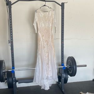 Lace 3/4 sleeve wedding dress with low cut out back